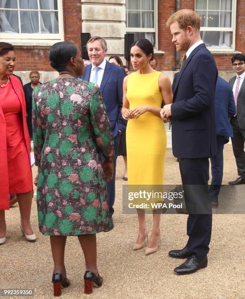 Prince Harry, Duke of Sussex and Meghan, Duchess of Sussex attend the Your Commonwealth Youth Challenge reception at Marlborough House on July 05,...