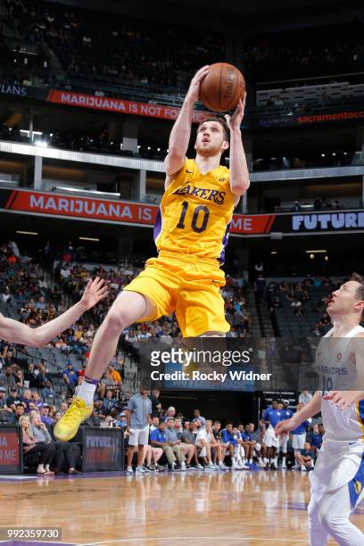 Svi Mykhailiuk of the Los Angeles Lakers goes to the basket against the Golden State Warriors during the 2018 Summer League at the Golden 1 Center on...