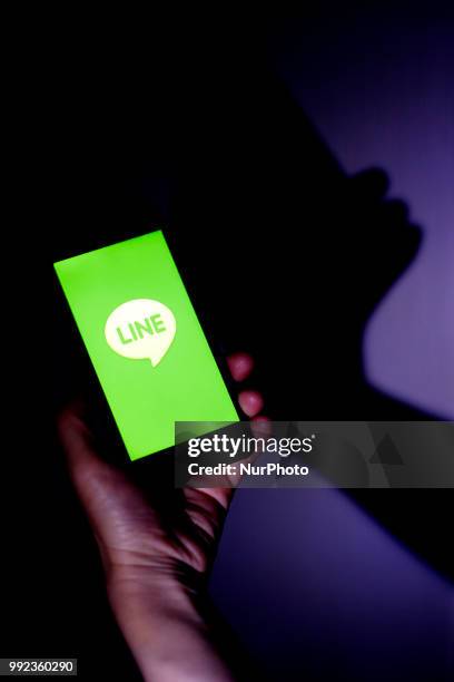 He logo of free messaging app Line is pictured on a smartphone in this photo illustration taken in Tokyo, Japan July 06, 2018.