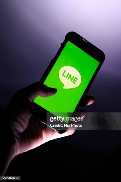 He logo of free messaging app Line is pictured on a smartphone in this photo illustration taken in Tokyo, Japan July 06, 2018.