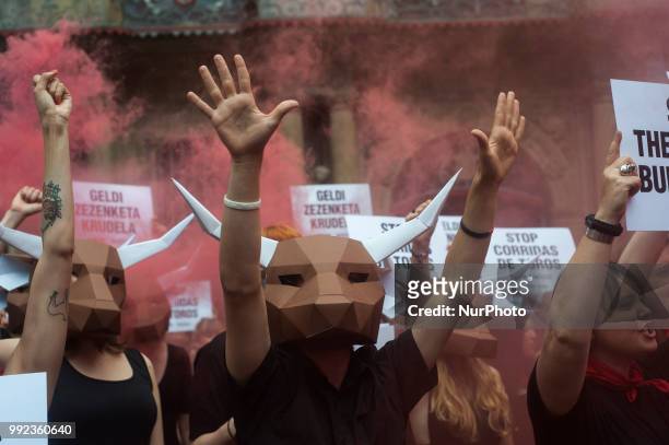 Members of the PETA collective during their protest in the Plaza del Ayuntamiento in Pamplona on the occasion of the San Fermin festival , on July 5,...