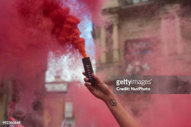 Detail of a red flare worn by a member of the PETA collective during his protest in the Plaza del Ayuntamiento in Pamplona on the occasion of the San...