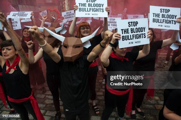 Members of the PETA collective during their protest in the Pamplona Town Hall Square on the occasion of the San Fermin festival , on July 5, 2018.