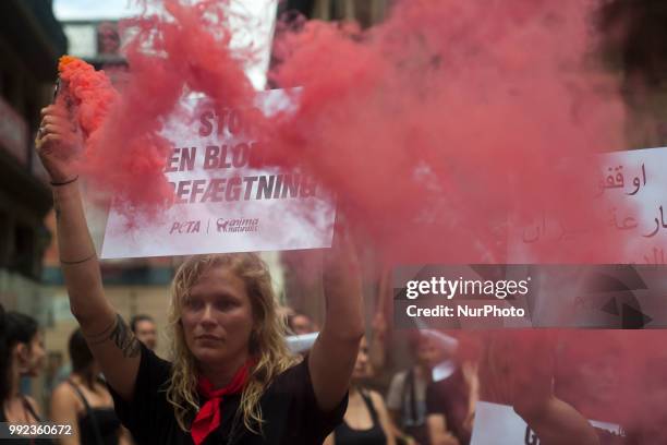 Young woman from the PETA collective during her protest in Pamplona City Hall on the occasion of the San Fermin festival , on July 5, 2018.