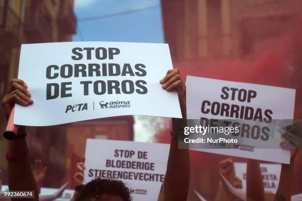 Detail of banners with the slogan &quot;Stop bullfighting&quot; carried by members of the PETA collective during their protest in the Plaza del...