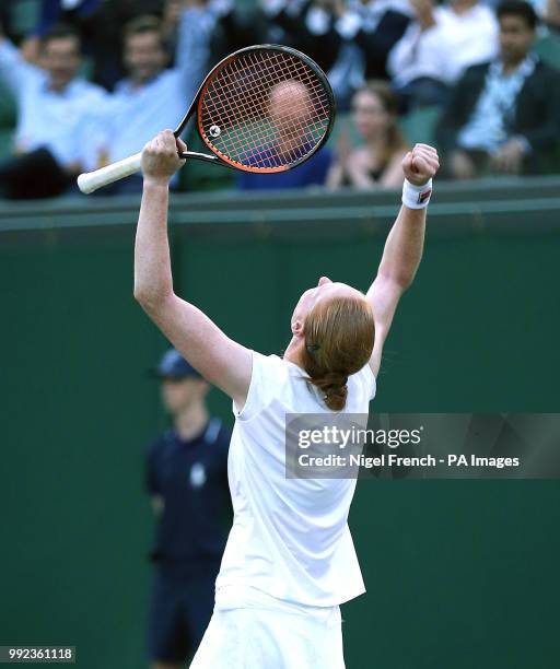 Alison Van Uytvanck celebrates her win against Garbine Muguruza on day four of the Wimbledon Championships at the All England Lawn Tennis and Croquet...