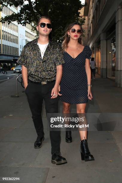 Rafferty Law and girlfriend Clementine Linares seen attending Magnum London - VIP launch party on July 5, 2018 in London, England.