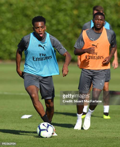 Joe Willock and Ainsley Maitland-Niles of Arsenal during a training session at London Colney on July 5, 2018 in St Albans, England.
