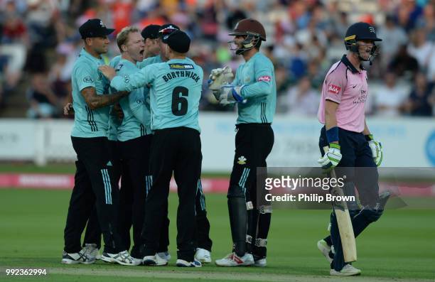 Gareth Batty of Surrey reacts after dismissing Nick Gubbins of Middlesex during the Vitality T20 Blast match between Middlesex and Surrey at Lord's...