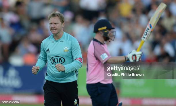 Gareth Batty of Surrey celebrates after dismissing Paul Stirling of Middlesex during the Vitality T20 Blast match between Middlesex and Surrey at...