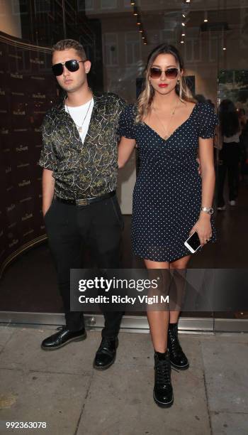 Rafferty Law and girlfriend Clementine Linares seen attending Magnum London - VIP launch party on July 5, 2018 in London, England.