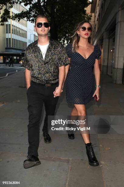 Rafferty Law and girlfriend Clementine Linares seen attending Magnum London - VIP launch party on July 5, 2018 in London, England.