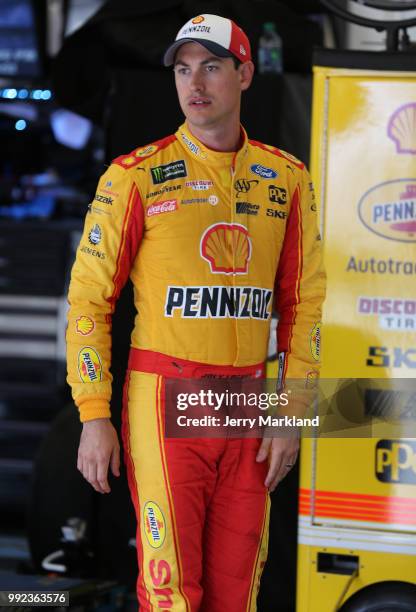 Joey Logano, driver of the Shell Pennzoil Ford, stands by his car during practice for the Monster Energy NASCAR Cup Series Coke Zero Sugar 400 at...