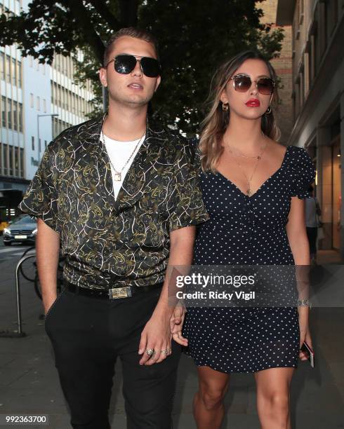 Rafferty Law and girlfriend Clementine Linares seen attending Magnum London - VIP launch party on July 5, 2018 in London, England.