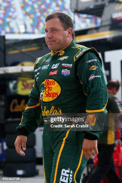 Ryan Newman, driver of the Bass Pro Shops/Cabela's Chevrolet, walks to his car during practice for the Monster Energy NASCAR Cup Series Coke Zero...