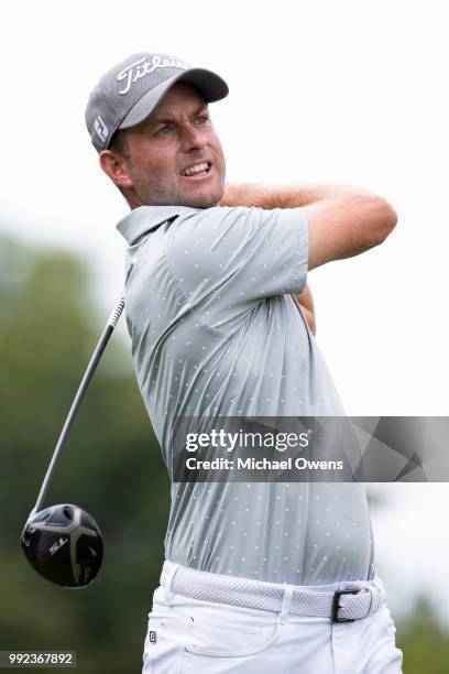 Webb Simpson tees off the 12th hole during round one of A Military Tribute At The Greenbrier held at the Old White TPC course on July 5, 2018 in...