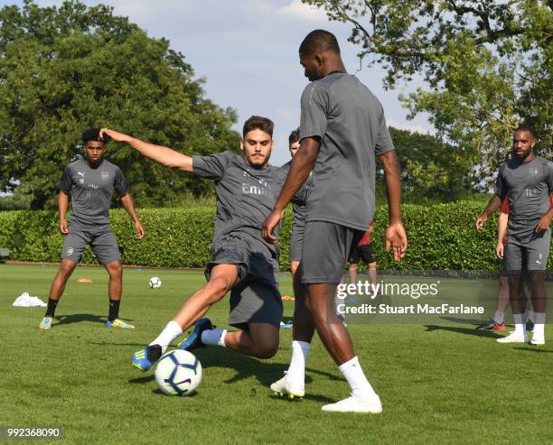 Konstantinos Mavropanos and Ainsley Maitland-Niles of Arsenal during a training session at London Colney on July 5, 2018 in St Albans, England.