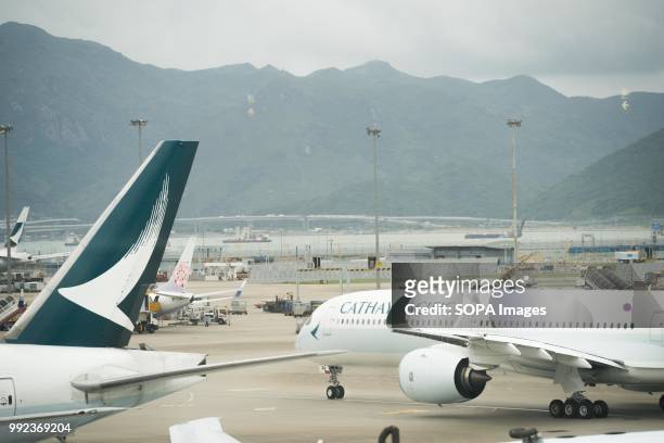 Cathay Pacific Airbus A350-900 aircraft seen heading to runway for departure in Hong Kong airport.