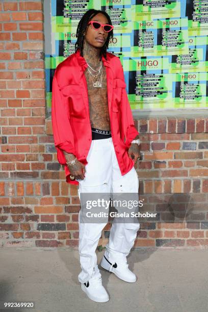 Wiz Khalifa attends the HUGO show during the Berlin Fashion Week Spring/Summer 2019 at Motorwerk on July 5, 2018 in Berlin, Germany.