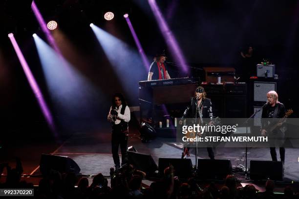 Actor Johnny Depp and singer Alice Cooper perform with The Hollywood Vampires band during the 52th Montreux Jazz Festival on July 5, 2018 in Montreux.