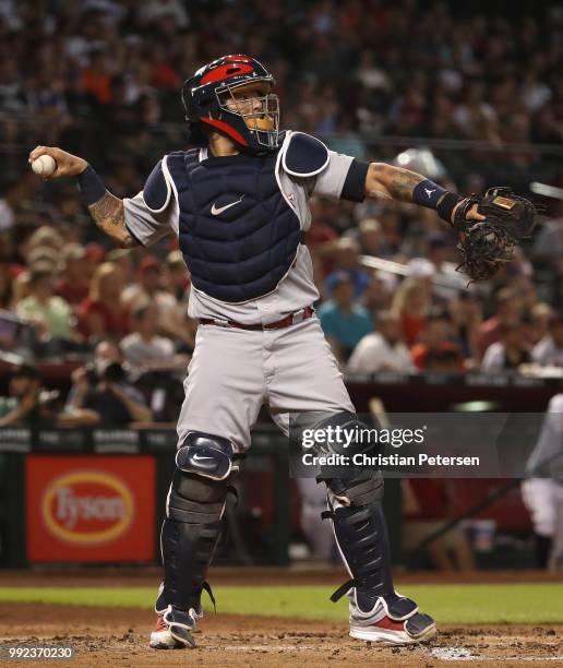 Catcher Yadier Molina of the St. Louis Cardinals in action during the MLB game against the Arizona Diamondbacks at Chase Field on July 3, 2018 in...