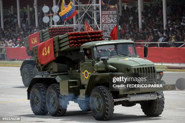 Russian-made rocket launcher truck takes part in a military parade to celebrate the 207th anniversary of the Venezuelan Independence in Caracas on...