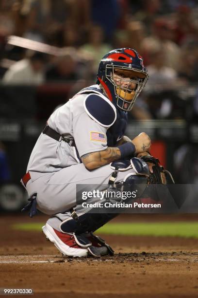 Catcher Yadier Molina of the St. Louis Cardinals in action during the MLB game against the Arizona Diamondbacks at Chase Field on July 3, 2018 in...