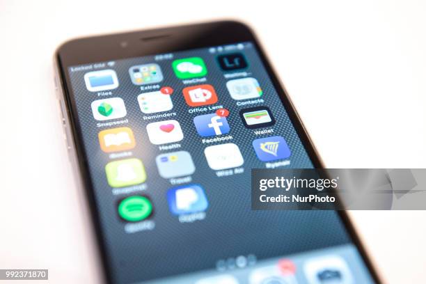 Application icons are seen on the homescreen of an Apple iPhone in this photo illustration on July 5, 2018.