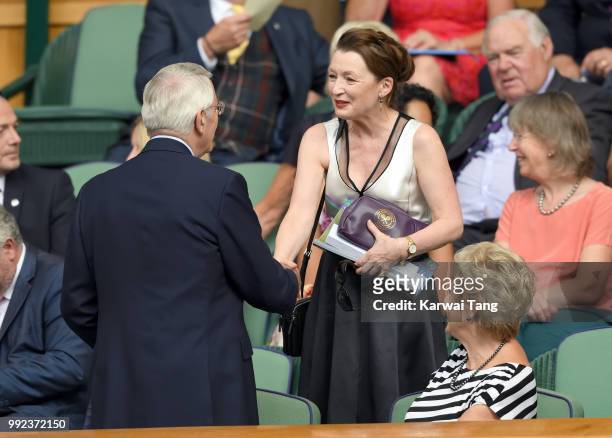 John Major and Lesley Manville attend day four of the Wimbledon Tennis Championships at the All England Lawn Tennis and Croquet Club on July 5, 2018...