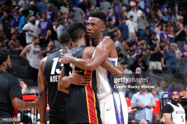 Harry Giles of the Sacramento Kings hugs Derrick Jones Jr. #5 of the Miami Heat after the game between the two teams during the 2018 Summer League at...