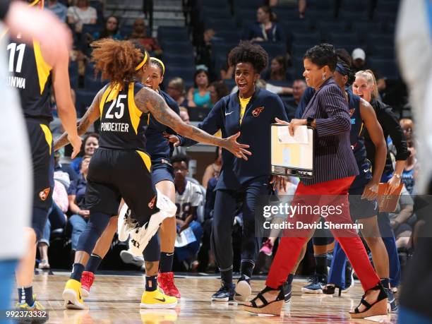 Cappie Pondexter and Shenise Johnson of the Indiana Fever celebrate during the game against the Minnesota Lynx on July 3, 2018 at Target Center in...