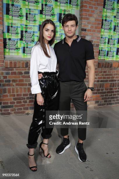 Luise Befort and Eugen Bauder attend the HUGO show during the Berlin Fashion Week Spring/Summer 2019 at Motorwerk on July 5, 2018 in Berlin, Germany.
