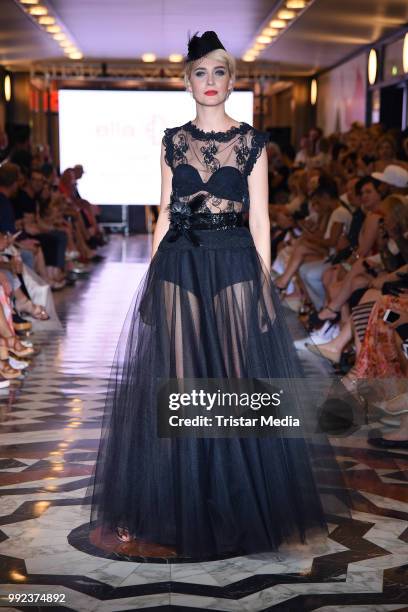 Julia Meise walks the runway at the Fashion2Show show during the Berlin Fashion Week Spring/Summer 2019 at Quartier 206 on July 5, 2018 in Berlin,...