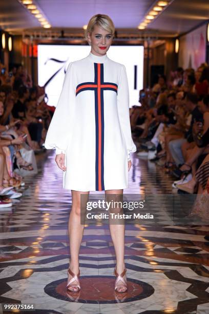Nina Meise walks the runway at the Fashion2Show show during the Berlin Fashion Week Spring/Summer 2019 at Quartier 206 on July 5, 2018 in Berlin,...