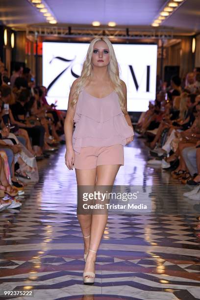 Anna Hiltrop walks the runway at the Fashion2Show show during the Berlin Fashion Week Spring/Summer 2019 at Quartier 206 on July 5, 2018 in Berlin,...