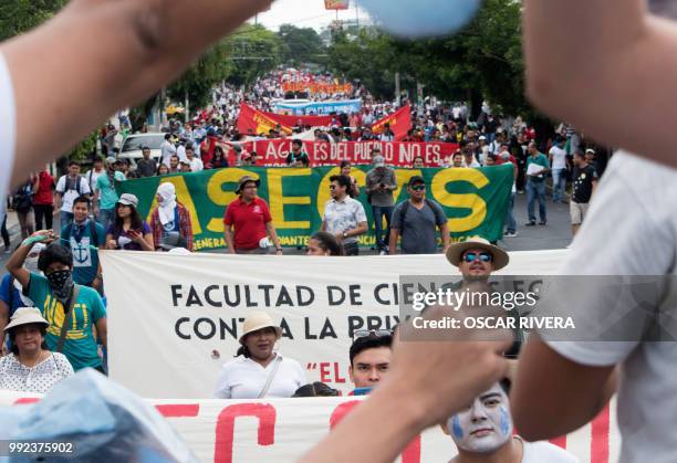 Hundreds of Salvadorans march during a protest against a water privatization bill under consideration of lawmakers in San Salvador, on July 5, 2018.