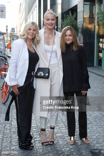 Micaela Sabatier , Franziska Knuppe and Sarah Hein during the Strenesse exclusive dinner at Borchardt Restaurant on July 5, 2018 in Berlin, Germany.