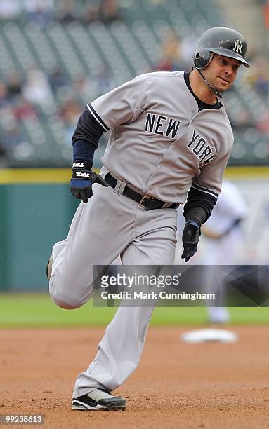 Nick Swisher of the New York Yankees runs the bases during the first game of a double header against the Detroit Tigers at Comerica Park on May 12,...