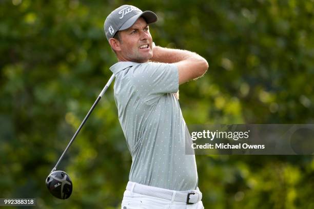 Webb Simpson tees off the 16th hole during round one of A Military Tribute At The Greenbrier held at the Old White TPC course on July 5, 2018 in...