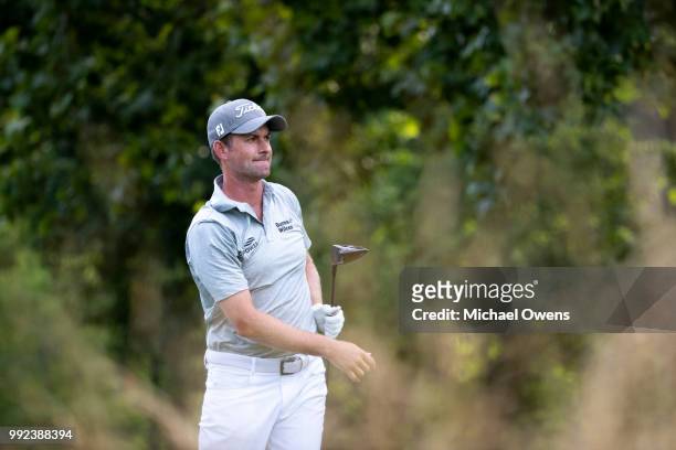 Webb Simpson tees off the 17th hole during round one of A Military Tribute At The Greenbrier held at the Old White TPC course on July 5, 2018 in...