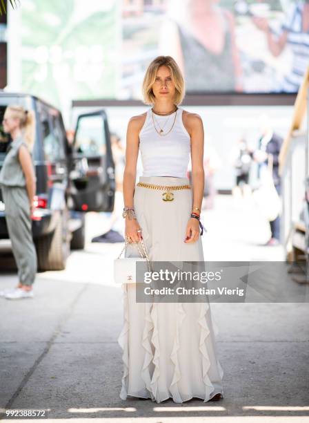 Lisa Hahnbueck wearing ruffled maxi skirt, white top, white Chanel bag seen outside Lana Mueller during the Berlin Fashion Week July 2018 on July 5,...