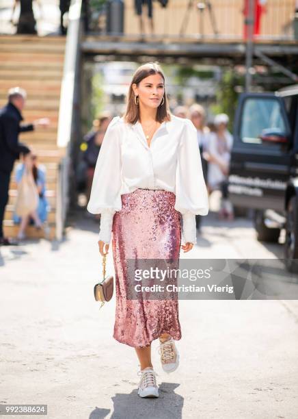 Nina Schwichtenberg wearing high waist pink glitter, white button shirt, Chloe bag is seen outside Lana Mueller during the Berlin Fashion Week July...