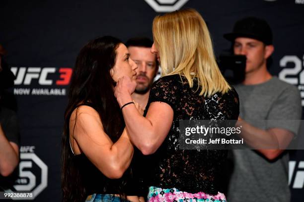 Jamie Moyle and Emily Whitmire face off for media during the UFC 226 Ultimate Media Day at Palms Casino Resort on July 5, 2018 in Las Vegas, Nevada.