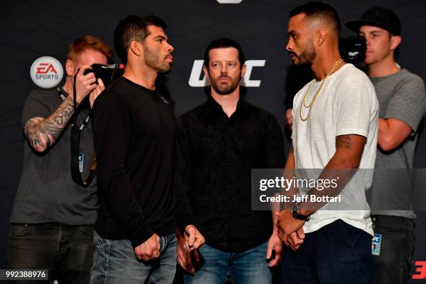 Raphael Assuncao of Brazil and Rob Font face off for media during the UFC 226 Ultimate Media Day at Palms Casino Resort on July 5, 2018 in Las Vegas,...