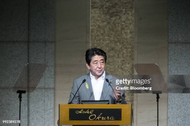 Shinzo Abe, Japan's prime minister, pauses while speaking at The Shared Values and Democracy in Asia symposium in Tokyo, Japan, on Thursday, July 5,...