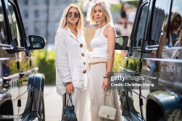 Nina Suess wearing linen button shirt and Lisa Hahnbueck wearing ruffled maxi skirt, white top, white Chanel bag seen outside Lana Mueller during the...