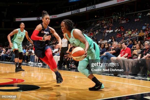 Epiphanny Prince of the New York Liberty handles the ball against the Washington Mystics on July 5, 2018 at the Verizon Center in Washington, DC....