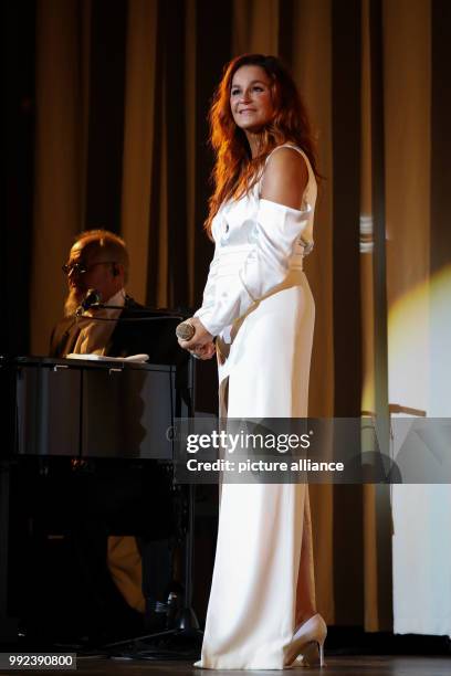 Singer Andrea Berg can be seen during the first concert of her tour "Hautnah" at the Laezishalle in Hamburg, Germany, 16 October 2017. With her...