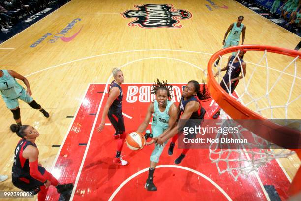 Epiphanny Prince of the New York Liberty goes to the basket against the Washington Mystics on July 5, 2018 at the Verizon Center in Washington, DC....