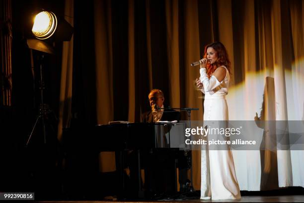 Singer Andrea Berg can be seen during the first concert of her tour "Hautnah" at the Laezishalle in Hamburg, Germany, 16 October 2017. With her...